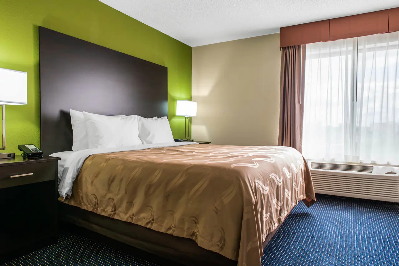 Deluxe guest room with queen bed