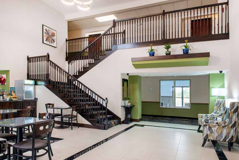 https://qualityinnanderson.com/wp-content/uploads/2017/08/staircase-lobby-quality-inn-anderson-indiana.jpg